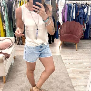 Shorts con micro borchie